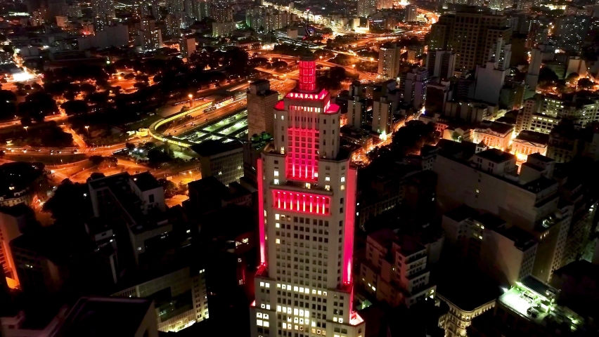 Sao Paulo Brazil. Night metropolis aerial landscape of city of Sao Paulo, Brazil. Night city aerial view with illumination avenue and buildings. Night city. City night. Altino Arantes building red.