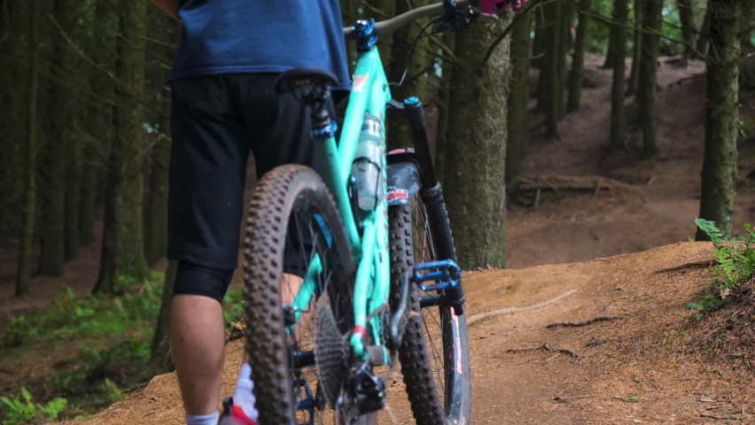 Devon , United Kingdom (UK) - 07 07 2020: Cyclist With A Mountain Bike In The Forest