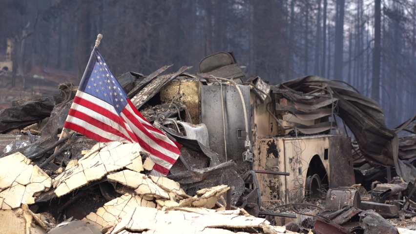 Burned over fire engine in burnt town