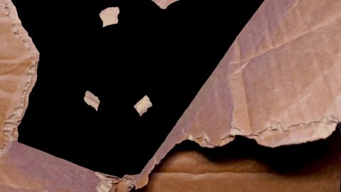 Paper stop motion animation. Cardboard crumples transition with black png background
