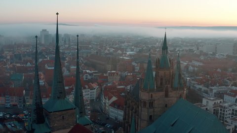 Aerial Panning Popular St. Severus Church In Old Town Against Sky During Foggy Weather - Erfurt, Germany