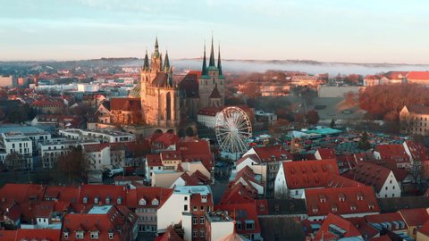 Aerial Forward Shot Of Beautiful Popular St. Severus During Winter, Drone Flying Over Houses In Old Town - Erfurt, Germany