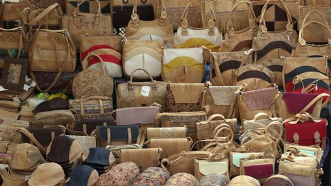 Close-Up Lockdown Shot Of Handbags Arranged In Row - Porto, Portugal