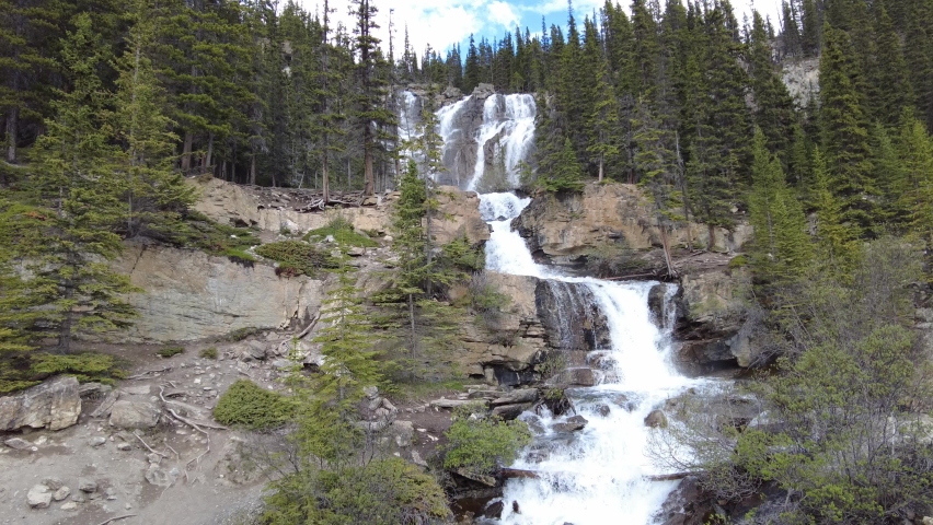 Cascading Tangle Creek Falls in Jasper National Park, Alberta, Canada. Beautiful waterfall along Icefields Parkway on a way to Jasper. 