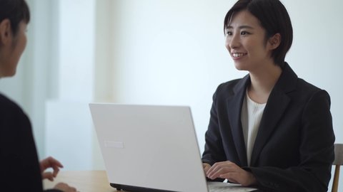 Image of a smiling female employee 
