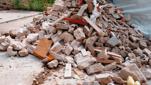 Pile of Cinder Blocks Cement and Various Potentially Hazardous Toxic Construction Waste