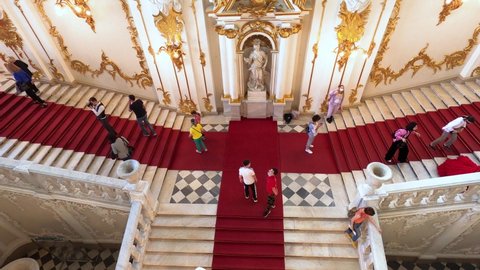Saint Petersburg, Russia, May 11, 2021. Winter Palace in St. Petersburg. Jordan staircase. Photoshoot inside the palace. Numerous tourists start their sightseeing from the Jordan Stairs.