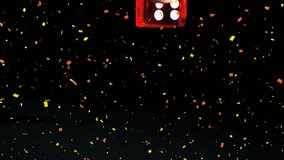 Confetti falling over red casino dice falling against black background. new years eve party and celebration concept - Powered by Shutterstock - Get 15% off with code: PIKWIZARD15