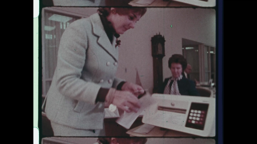 1970s Yonkers, NY. Woman embraces the Equal Credit Opportunity Act and Opens a Credit Card with a Female Banker. Second Wave Feminism creating Gender Equality. 4K Overscan of Vintage Archival Film  