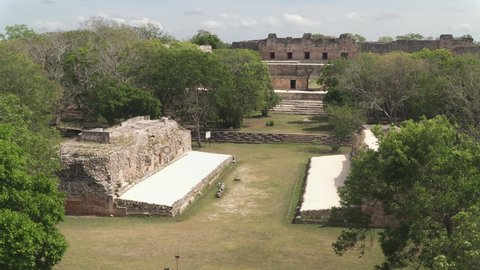 UXMAL, MEXICO - CIRCA 2021: Aerial view of "Pok-ta-pok" court ruins in ancient Mayan city of Uxmal, Yucatan