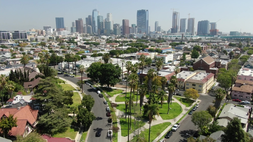 Aerial Los Angeles Downtown Pico Union and Palm Trees Forward Tilt Up California USA | Shutterstock HD Video #1077929858