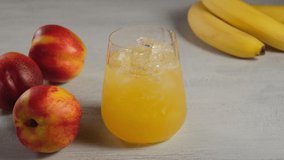  Fruit juice in drinking glass.