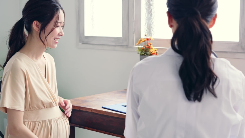 Pregnant woman taking consultation in the clinic. 