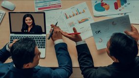Creative visual of business people in a corporate staff meeting on video call . Concept of digital technology for marketing data analysis and investment decision making . - Powered by Shutterstock - Get 15% off with code: PIKWIZARD15