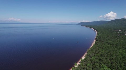 Summertime aerial imagery of Lake Baikal is a rift lake located in southern Siberia, Russia Baikal lake summer landscape view. Drone's Eye View.