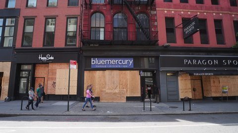 NEW YORK, USA – JUNE 4: Stores around Union Square, which are boarded up for prevention from mob violence of George Floyd death during the Pandemic of COVID-19 at New York NY on June 04 2020.


