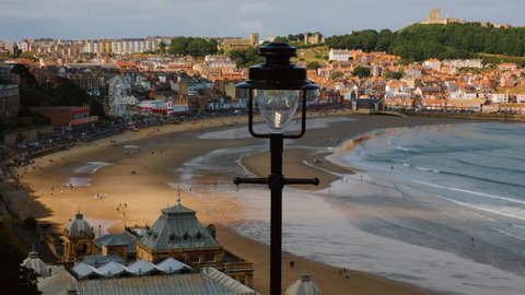 SCARBOROUGH, circa 2021 - Panoramic shot of Scarborough beach during sunset in North Yorkshire, England, UK, the largest holiday resort on the Yorkshire Coast