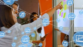 Network of digital icons against diverse office colleagues discussing over memo notes at office. global networking and business technology concept - Powered by Shutterstock - Get 15% off with code: PIKWIZARD15