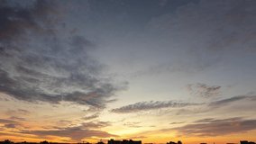 morning sunrise sky. orange warm twilight color in the sky. clouds moving slow in the atmosphere. amazing landscape. majestic cloudscape nature background 4k timelapse footage. golden time sky