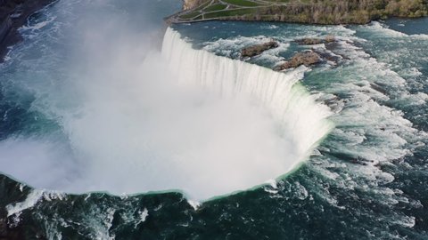 Aerial panorama of huge water flows down the waterfall, Horseshoe Water Fall in Niagara