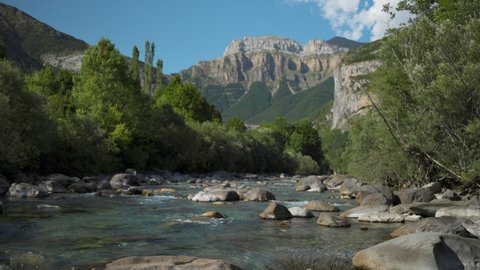 Video of a wild river and the mountains in the monte pedido natural park in aragon spain
