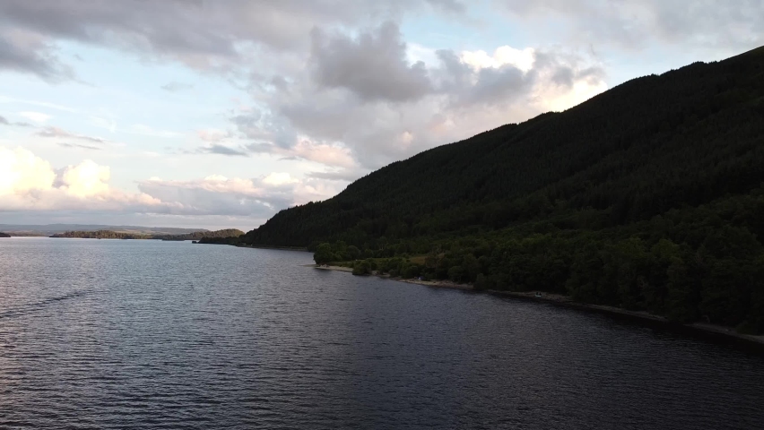 Loch lomond Lake in Scotland, after sunset, from dron