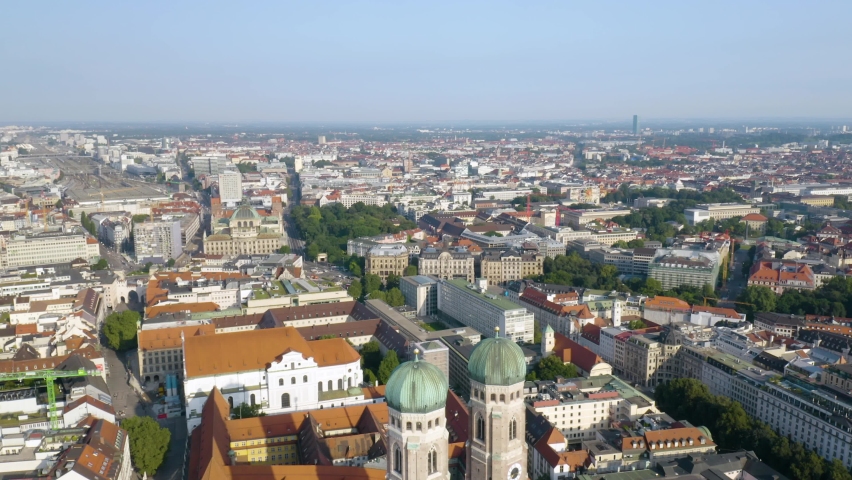 Drone Flying Away from Munich Cathedral Reveals Famous Marienplatz Square in Munich, Germany Royalty-Free Stock Footage #1078002692