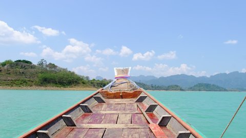 Amazing View from Boat trip longtail boat to tropical Mountains Rain Forest at Cheow Lan Lake in Khao Sok National Park in Thailand. Vacation at Famous Touristic Place