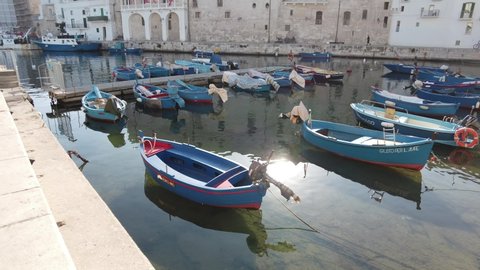 Old harbour in Monopoli on a summer morning, Bari Province, Puglia (Apulia), southern Italy. July-29-2021