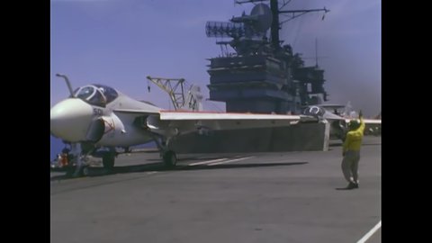 CIRCA 1960 - Two US Navy A-6 jets take off from the USS Forrestal.