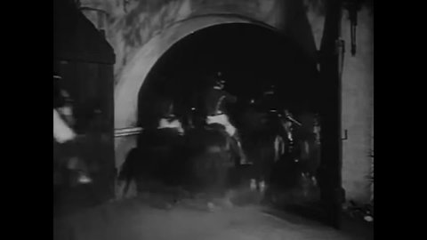 CIRCA 1936 - In this adventure movie, Zorro uses a lasso to fend off soldiers, then escapes on horseback.