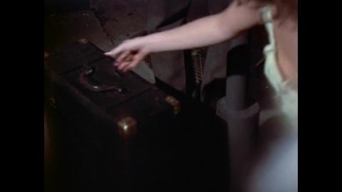 CIRCA 1978 - In this drama film, a prostitute steals a man's suitcase when he stops to listen a New Orleans boy play the trumpet on the sidewalk.