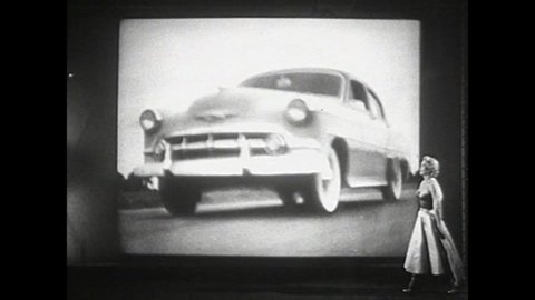 CIRCA 1950s - Dinah Shore sings on a set and introduces the new 1953 Chevrolet car.