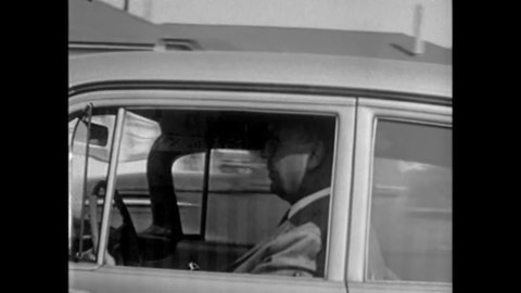 CIRCA 1961 - A policeman driving to a school warns teenage boys about the dangers of gay men.