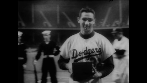 CIRCA 1957 - Roy Campanella, Sandy Koufax and other Brooklyn Dodgers are honored by the National Conference of Christians and Jews at Ebbets Field.