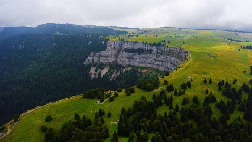 Aerial view of the Creux du Van in the Swiss Jura at sunrise.