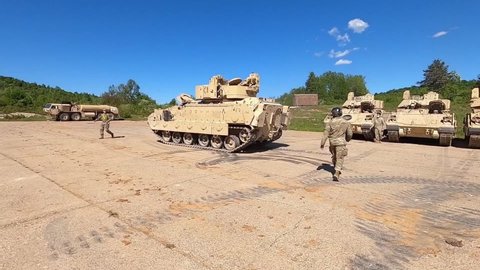 CIRCA 2021 U.S. Army Bradley Fighting Vehicles and tanks arrive in Croatia for a NATO allies military training exercise, Zagreb.