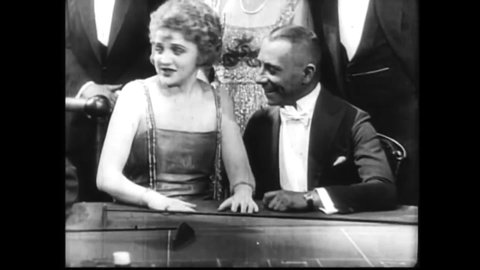 CIRCA 1922 - In this silent film, a woman wins at roulette at a casino in Monte Carlo.