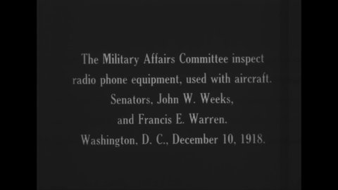 CIRCA 1918 - Senators Weeks and Warren inspect radio communications equipment with the Military Affairs Committee in Washington DC.