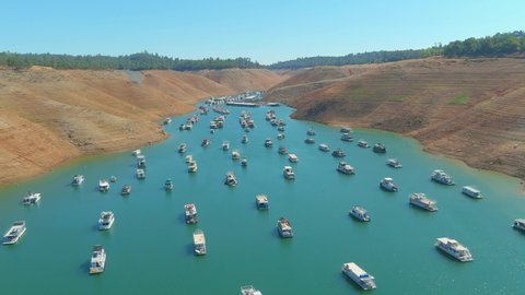 LAKE OROVILLE, CALIFORNIA - CIRCA 2021 - amazing aerial over drought stricken California Lake Oroville with low water levels.