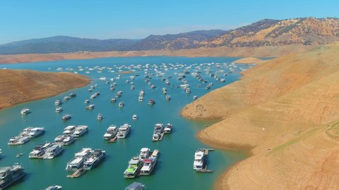 LAKE OROVILLE, CALIFORNIA - CIRCA 2021 - amazing aerial over drought stricken California Lake Oroville with low water levels.