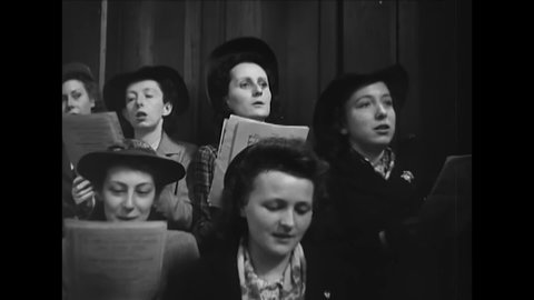CIRCA 1944 - A church choir sings and a sermon is given in Cherbourg, France on Bastille Day.