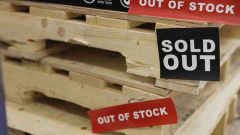 Sold Out and Out of Stock Signs on Empty Inventory Pallets
