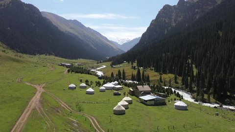 Mountains and yurts of Kyrgyzstan. Altyn Arashan gorge.