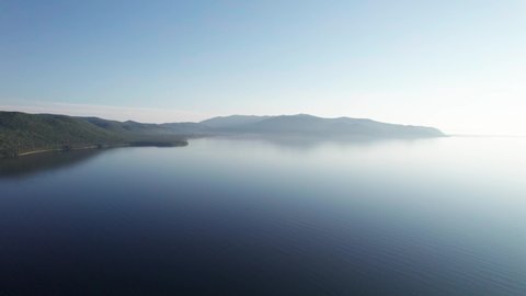 Summer morning aerial landscape of Lake Baikal is a rift lake located in southern Siberia, Russia Baikal lake summer landscape view. Drone's Eye View.