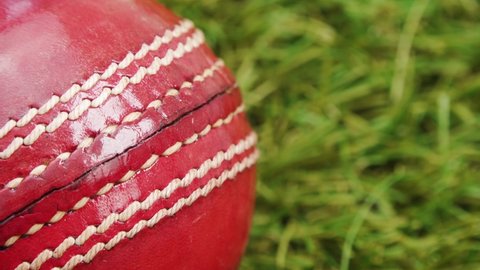 LEATHER CRICKET BALL EXTREME CLOSE UP STOCK FOOTAGE* Rotating slowly with a gentle 'ease out' stop at the end which enables the last frame to be extended if required.