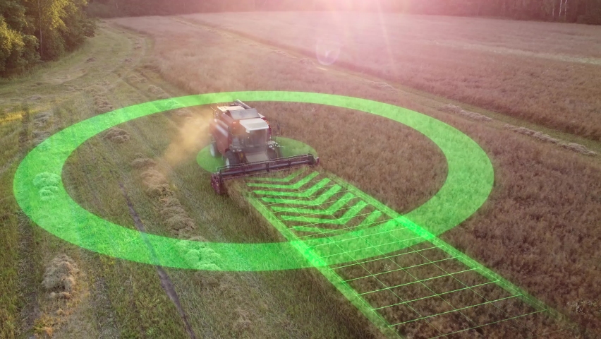 Autonomous self-driving combine harvester of the future with autopilot harvests grain field using GPS navigation system. Aerial view, animation with graphic HUD elements. | Shutterstock HD Video #1078066052