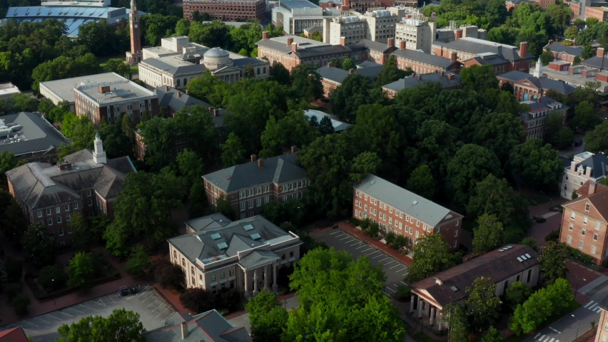 University of North Carolina campus grounds. Hospital Medical Center. Aerial reveal shot in summer. UNC. Royalty-Free Stock Footage #1078074233