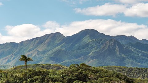 Mount Koghi dominates the paradisiacal landscape of New Caledonia - cloudscape time lapse