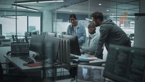 Diverse Multi-Ethnic Team in Modern Office: Teamwork of IT Programmers Gather Around Desktop Computer, Talking, Finding Solution. Specialists Create Software. Engineers Develop App, Program - Powered by Shutterstock - Get 15% off with code: PIKWIZARD15